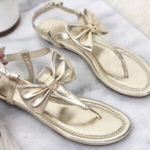 Kate  Spade New York  Gold Bow Thong Sandals.